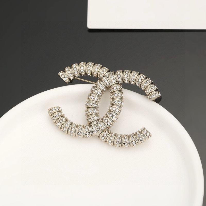Ch**el brooches